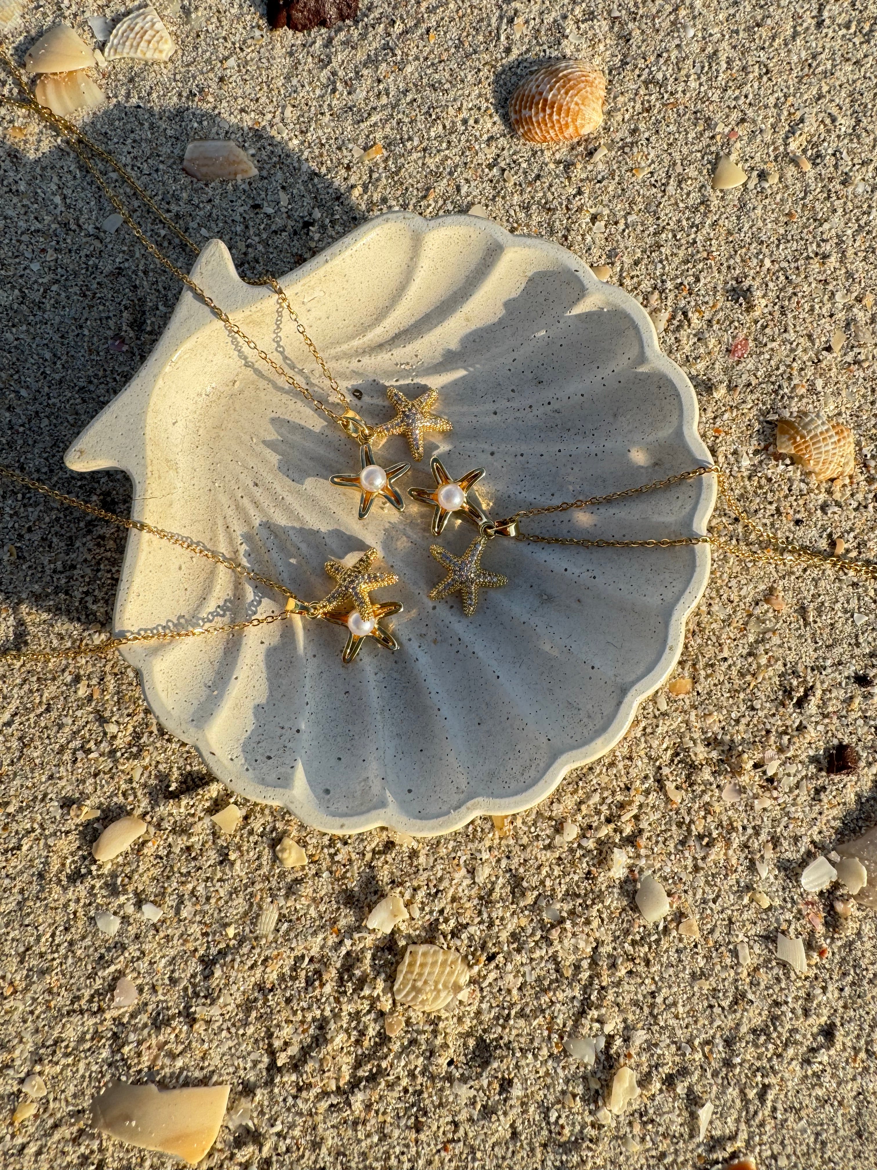 Estrella de mar con perla
