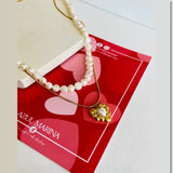 Collar perlas con corazon